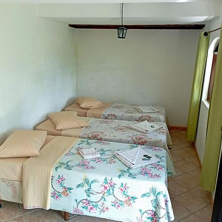 Pousada Nossa Senhora Penedo  Ngoại thất bức ảnh A bedroom in a hostel