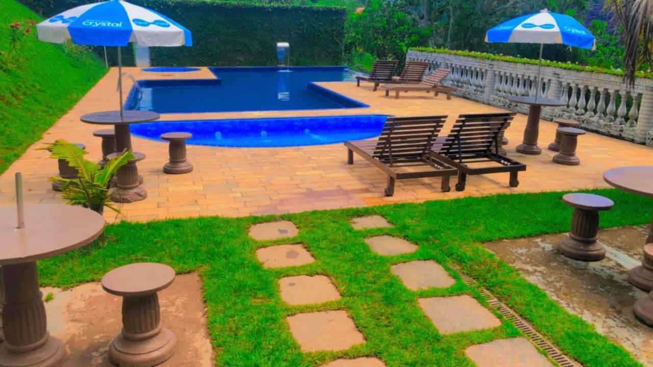 Pousada Nossa Senhora Penedo  Ngoại thất bức ảnh The pool at the hotel
