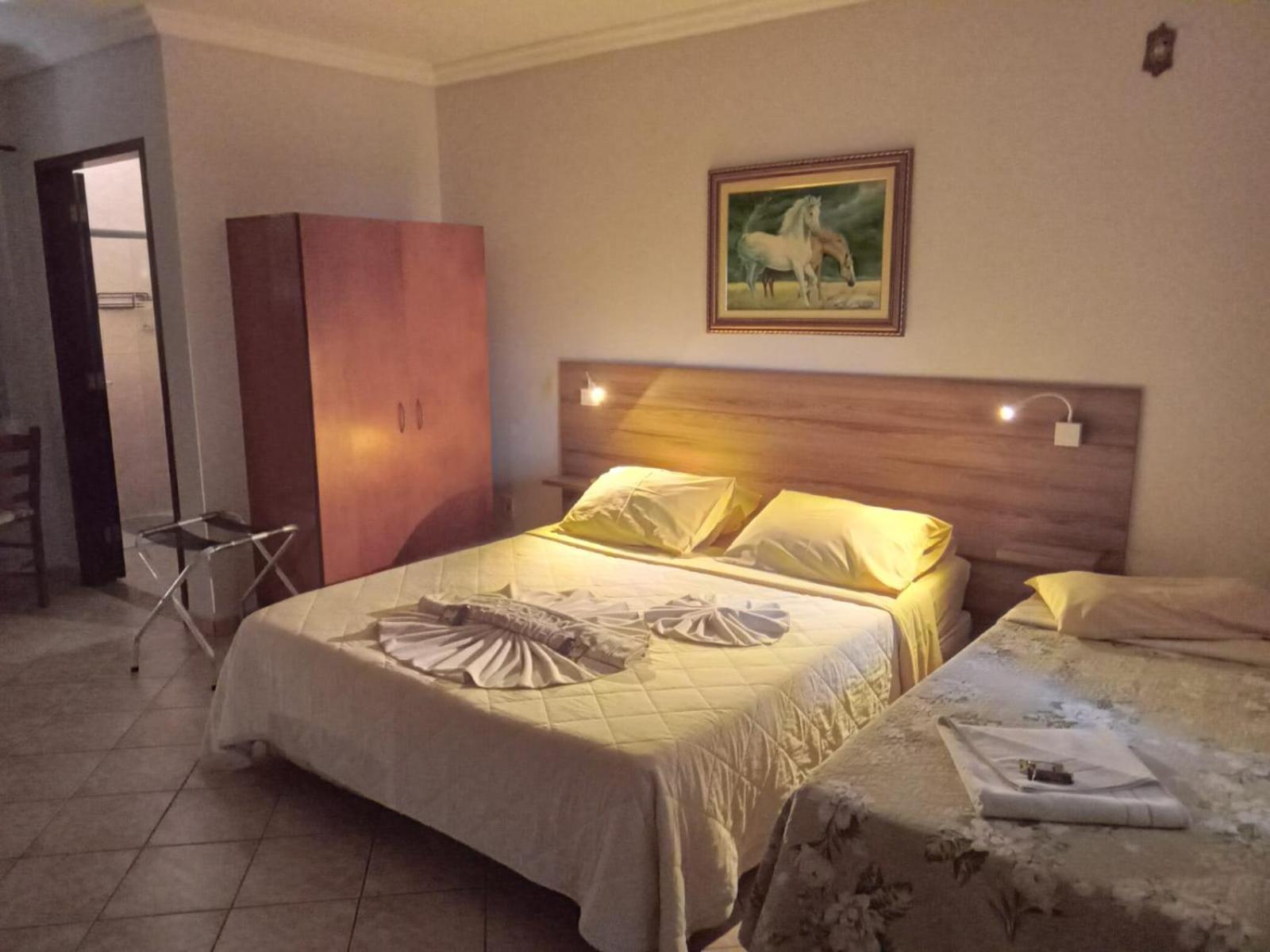 Pousada Nossa Senhora Penedo  Phòng bức ảnh A bedroom in a hotel