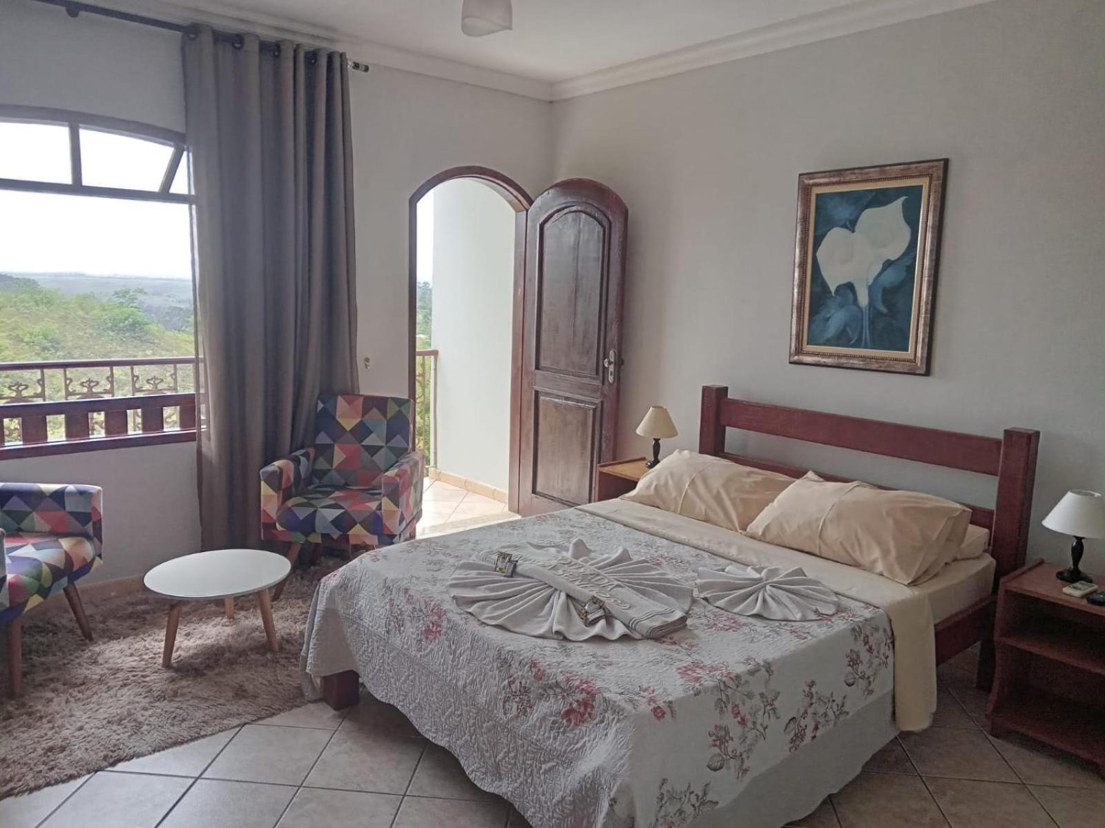 Pousada Nossa Senhora Penedo  Phòng bức ảnh A bedroom in a hotel