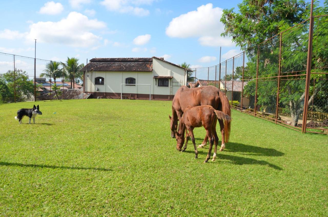 Pousada Nossa Senhora Penedo  Ngoại thất bức ảnh A horse farm in the city